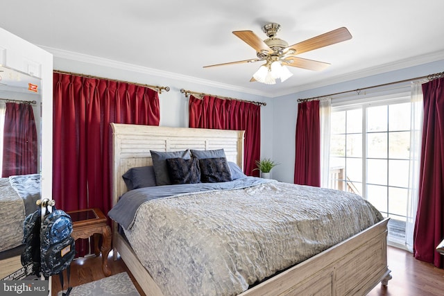 bedroom featuring ornamental molding, hardwood / wood-style floors, and ceiling fan