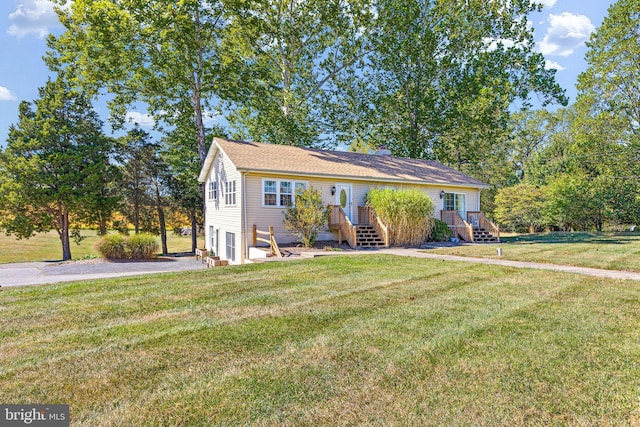 view of front of house with a front lawn