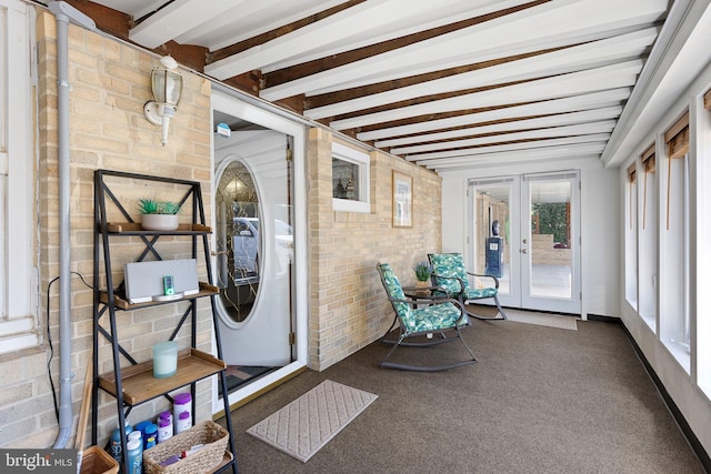 sunroom with french doors and beam ceiling