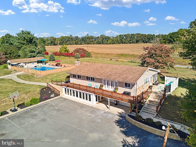 birds eye view of property with a rural view