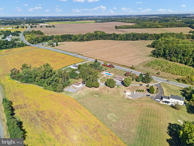 birds eye view of property featuring a rural view