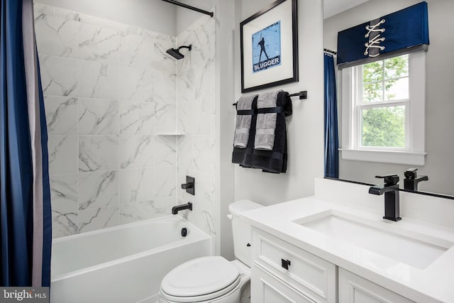 full bathroom featuring vanity, shower / bath combo, and toilet