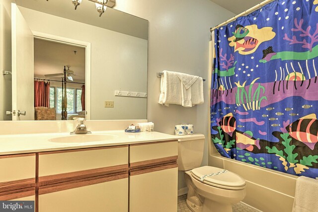 full bathroom featuring vanity, toilet, tile patterned floors, and shower / bath combination with curtain