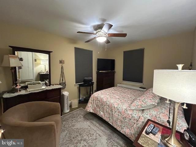 bedroom with carpet flooring and ceiling fan