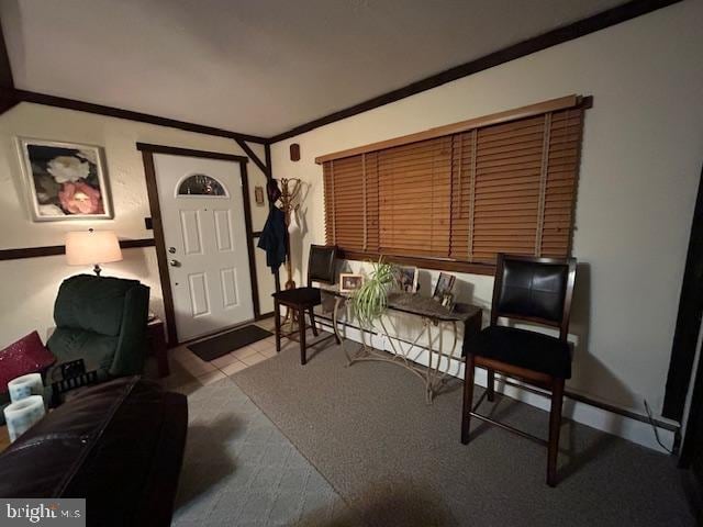 living room with ornamental molding and light colored carpet