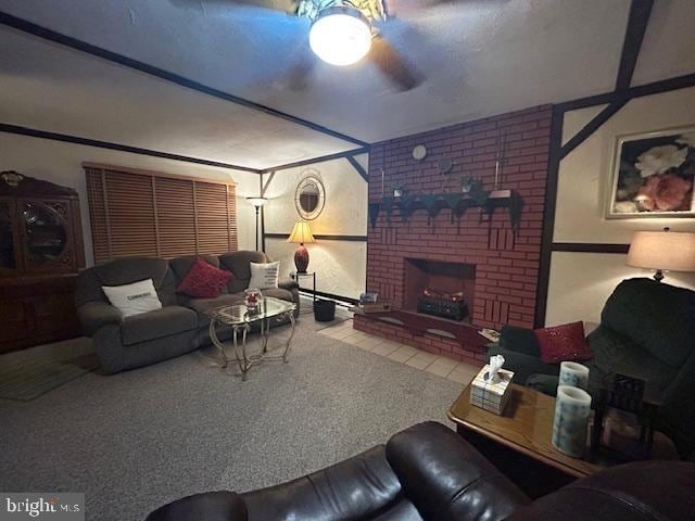 living room featuring carpet, a brick fireplace, and ceiling fan