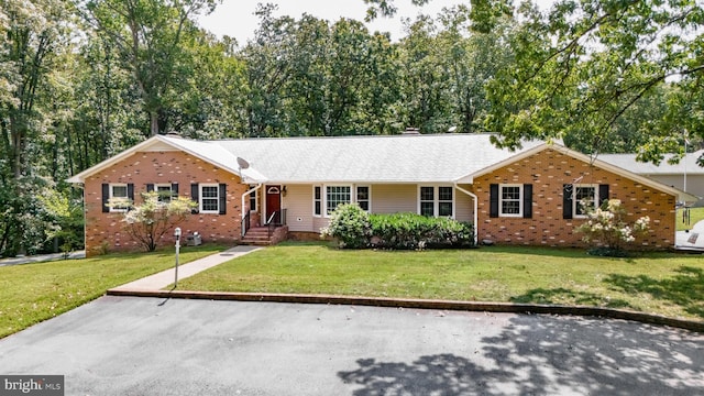 ranch-style house with a front yard