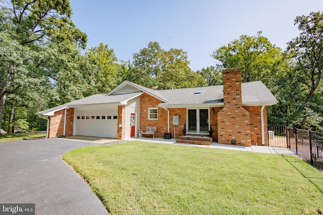 single story home with a front lawn and a garage