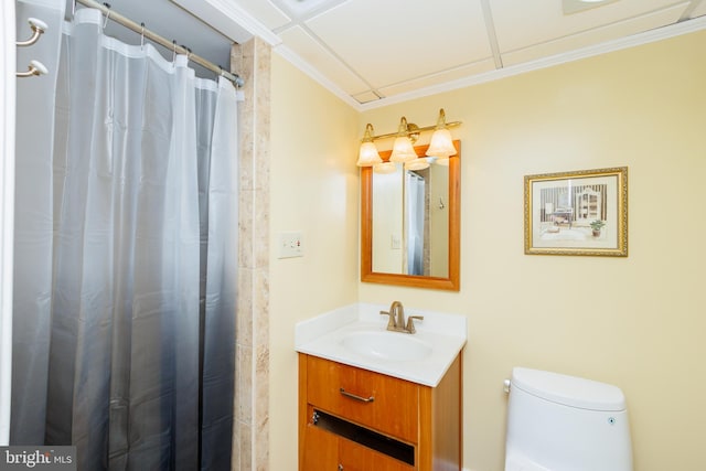 bathroom featuring vanity, crown molding, curtained shower, and toilet