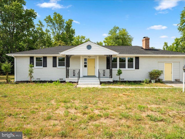 ranch-style home featuring a porch and a front lawn