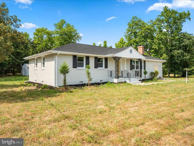 ranch-style house with a front lawn