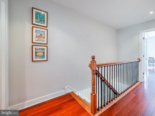 stairway with wood-type flooring