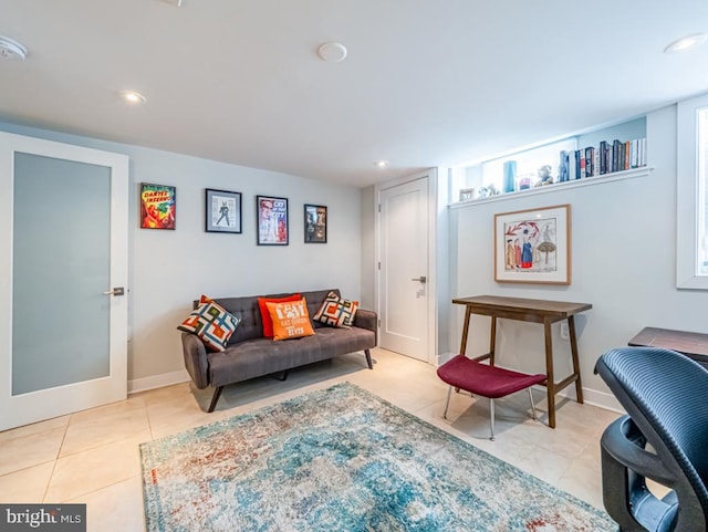 living area featuring light tile patterned floors