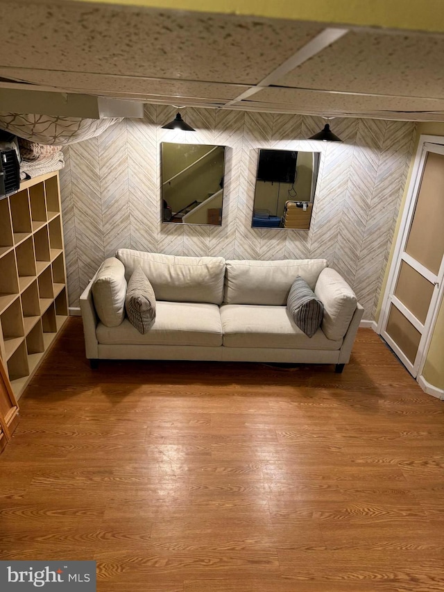 unfurnished living room featuring hardwood / wood-style flooring