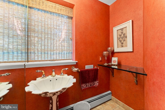 bathroom featuring tile patterned floors and a baseboard radiator