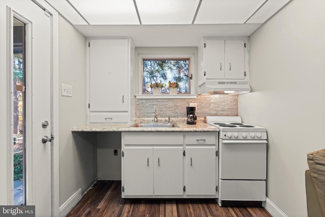 kitchen featuring white range, backsplash, range hood, sink, and white cabinetry