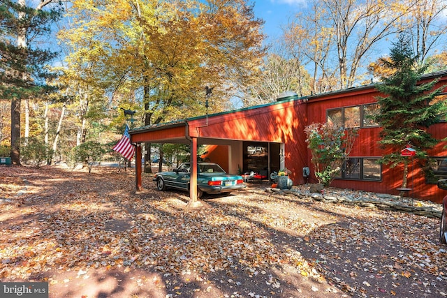 exterior space featuring a carport