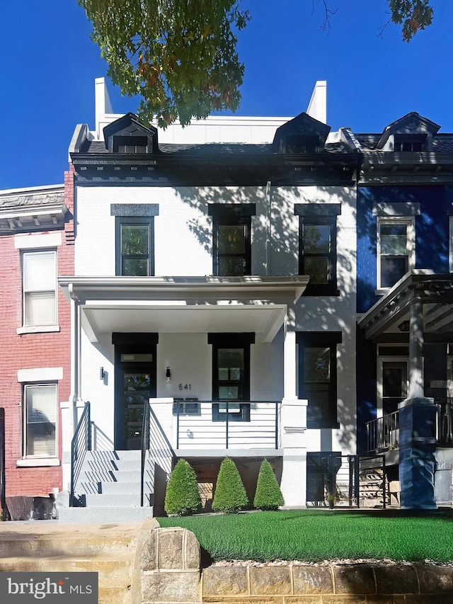 view of front of home featuring covered porch