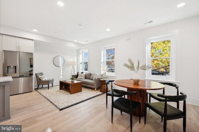 dining room featuring light hardwood / wood-style flooring