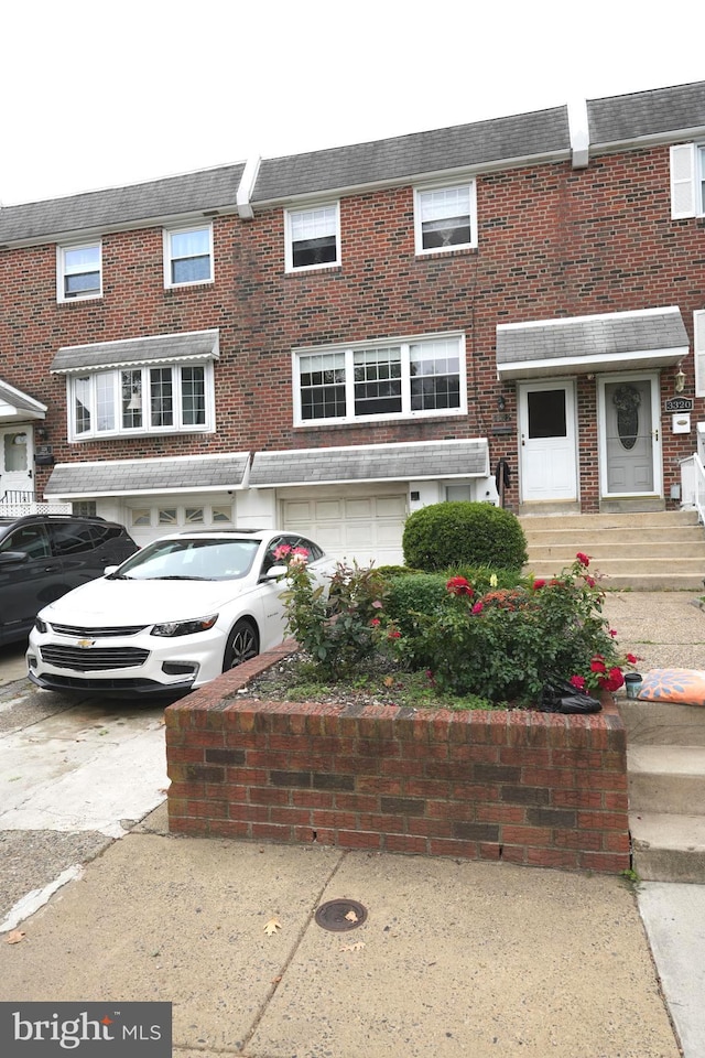 view of property featuring a garage