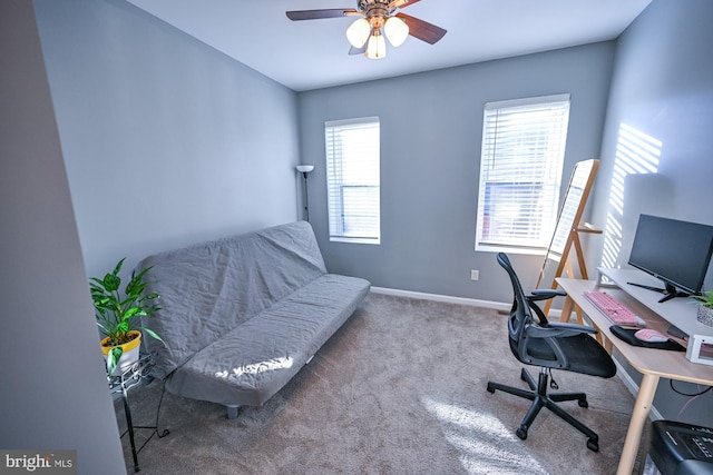 office space featuring carpet flooring and ceiling fan