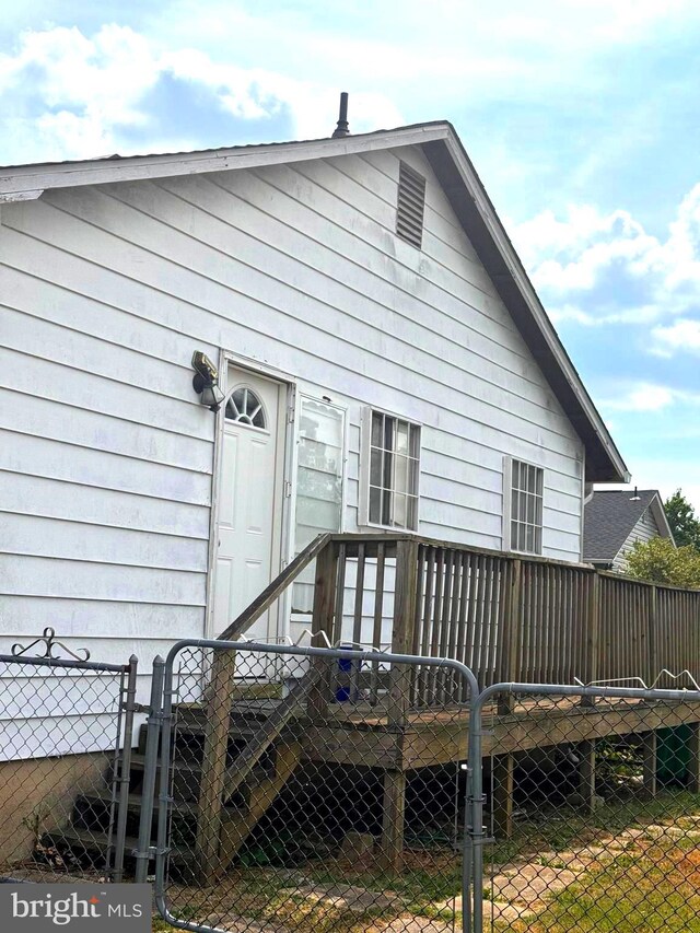 rear view of house with a deck