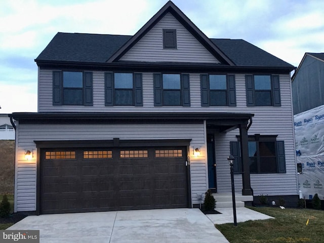 view of front of house with a garage