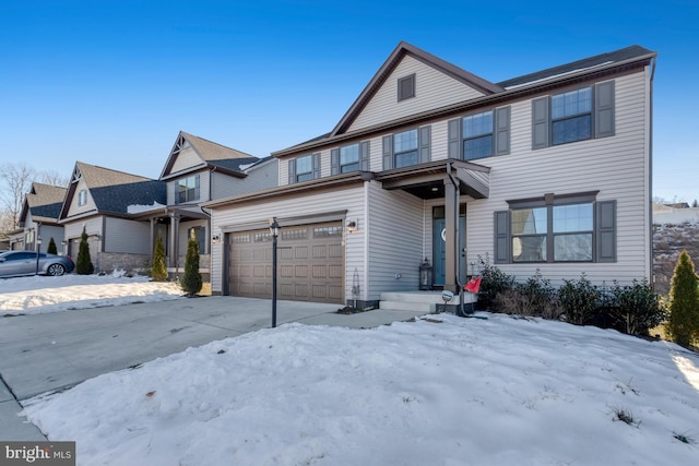 view of front of property with a garage