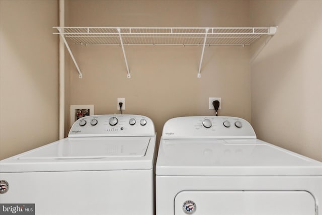 laundry area featuring washing machine and dryer