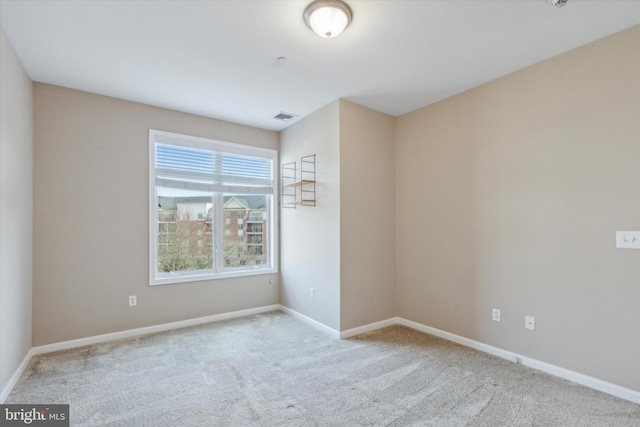 view of carpeted spare room