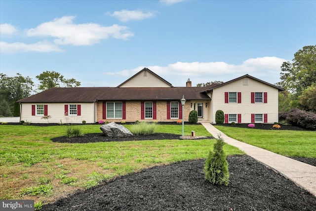 view of front facade with a front yard