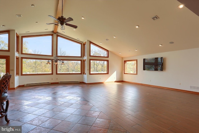 unfurnished living room with a wealth of natural light, a baseboard radiator, and high vaulted ceiling