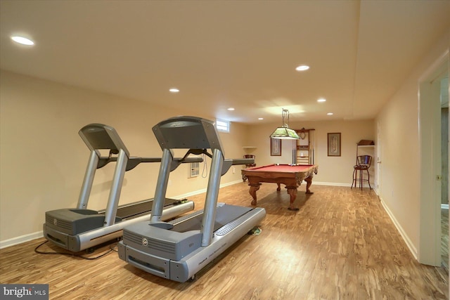 workout room featuring pool table and hardwood / wood-style flooring