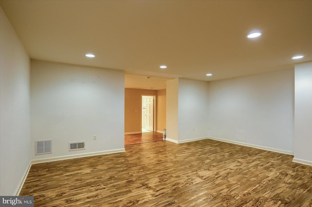 empty room featuring hardwood / wood-style floors