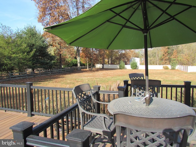 deck featuring a lawn