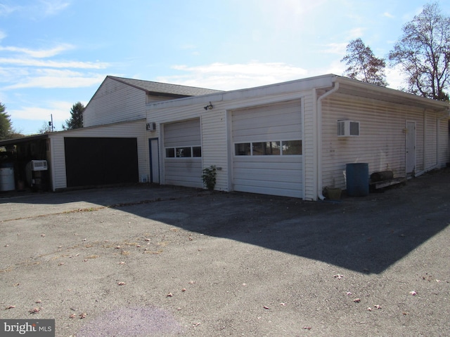 garage with a wall unit AC