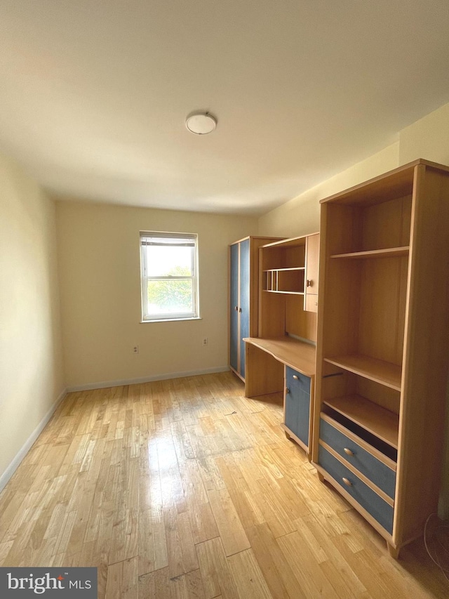 unfurnished bedroom featuring light hardwood / wood-style floors