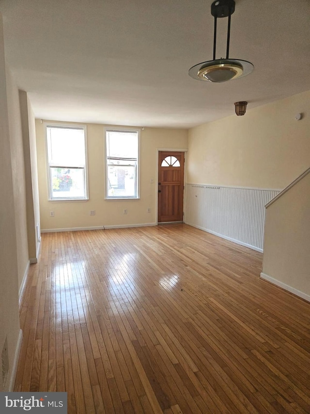 foyer with light hardwood / wood-style floors