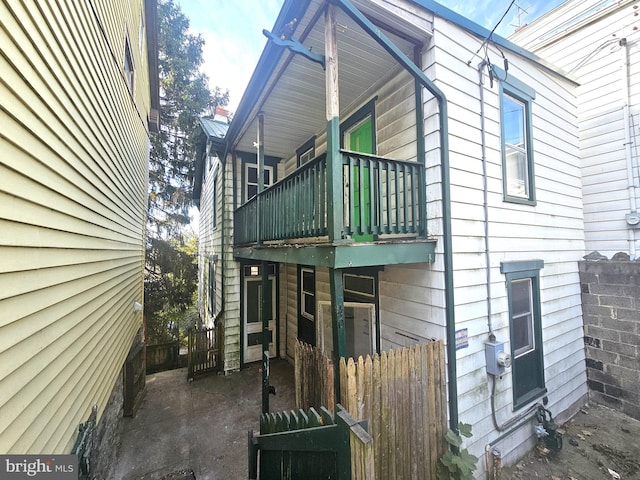 view of home's exterior featuring a balcony