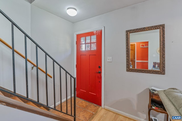 foyer entrance with light hardwood / wood-style flooring