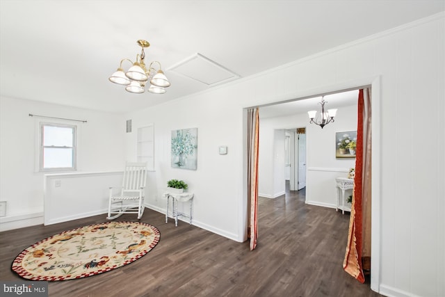 hall featuring ornamental molding and dark hardwood / wood-style floors