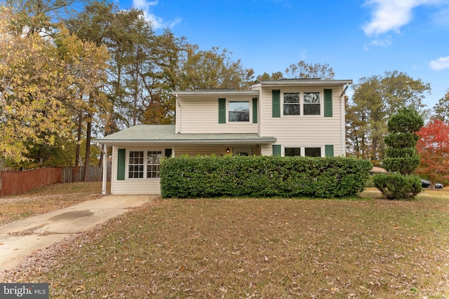 front facade with a front lawn