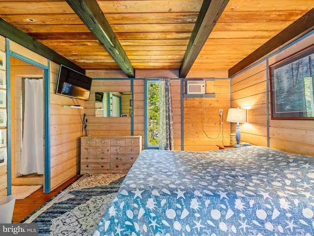 unfurnished bedroom with wood ceiling, hardwood / wood-style flooring, and beamed ceiling