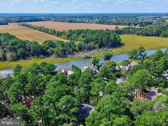 drone / aerial view with a water view and a rural view