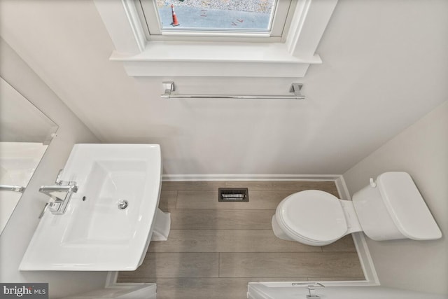 bathroom with sink and toilet