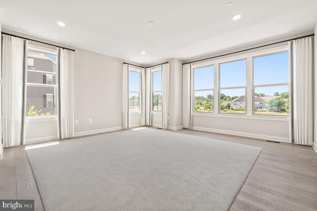 empty room featuring light hardwood / wood-style floors