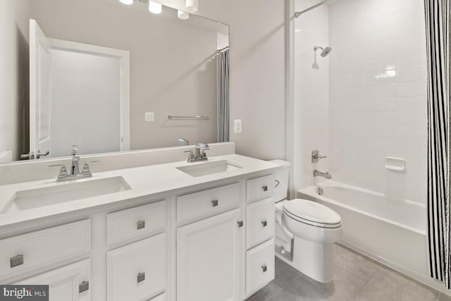 full bathroom with toilet, tile patterned flooring, vanity, and shower / tub combo