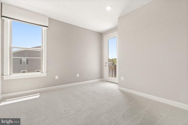 view of carpeted spare room