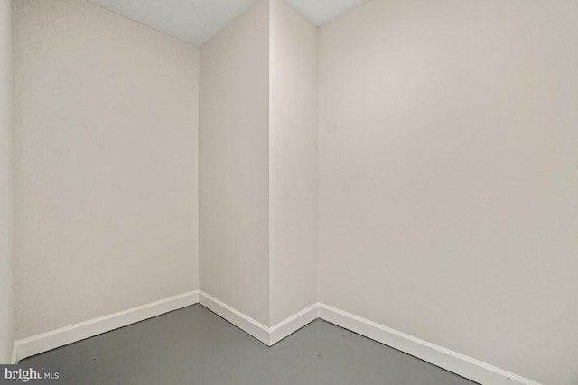 empty room featuring concrete floors