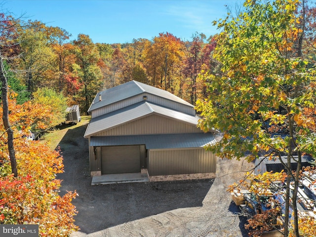 view of side of property with a garage